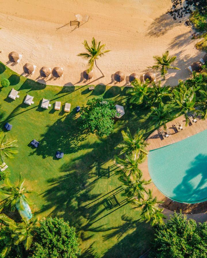 Lux* Grand Gaube Resort & Villas Esterno foto Aerial view of the beach at the Four Seasons Resort